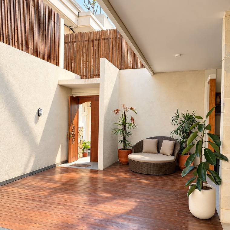 Pool deck with a round rattan daybed